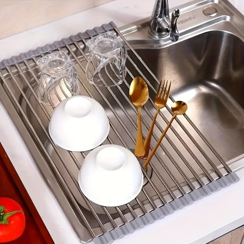 The Silicone Sink Organizer combines the functions of draining, washing vegetables and storing in one. It is made of heat-resistant material and can be rolled up. Easily deal with the mess of the kitchen sink and make cookies easily.